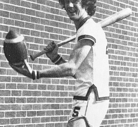 Terry West with baseball bat and football in basketball uniform