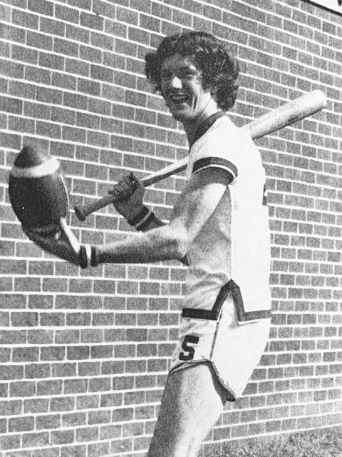 Terry West with baseball bat and football in basketball uniform